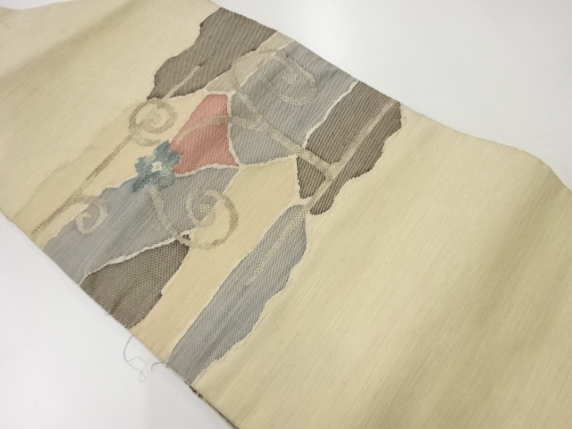 アンティーク　手織り紬花唐草模様織出し名古屋帯